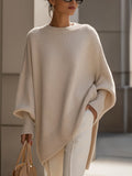 Damskie oversize'owe dziergane ponczo sweterowe
