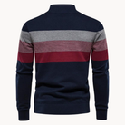 Navy blue sweater with red and gray horizontal stripes on a white background