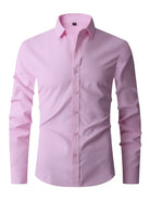 Camicia uomo rosa chiaro, maniche lunghe, colletto classico, bottoni frontali. Elegante e moderna, ideale per abbigliamento formale e casual.