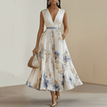 Elegancka plisowana sukienka maxi w kwiatowy wzór