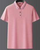 Maglietta polo rosa da uomo, maniche corte, colletto classico, bottoni frontali, tessuto leggero, ideale per abbigliamento casual ed estivo.